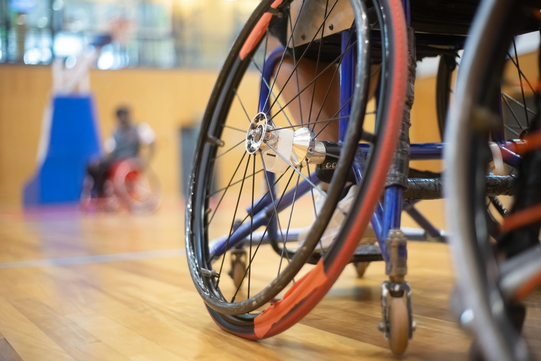 wheel of wheelchair at sports hall